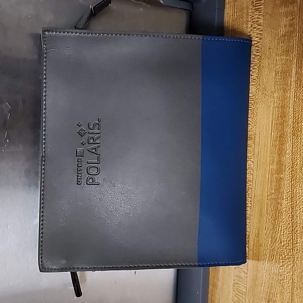 United Airlines Polaris Business Class leather look amenity pouch, gray/blue